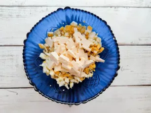 Cut the melted cheese into cubes and put in a bowl.