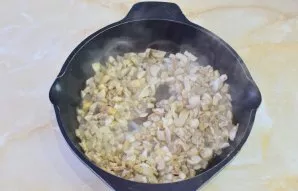 Next, add chopped champignons to the pan. Cook everything together for 5-6 minutes. Add a little salt. Cool the baked mushrooms to room t...