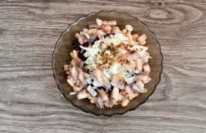 Drain the onion from the marinade and put it in a salad bowl. Put the pieces of herring, chop them about the size of a bean. Mix mustard ...