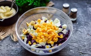 Add sweet corn to the salad.