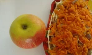 Put boiled grated carrots on top.