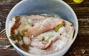 Mix salt with sugar and sprinkle the fish.