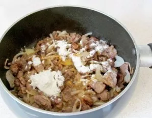 After 10 minutes, add flour, mix and continue cooking.