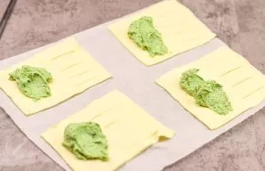 Put the prepared filling on half of each piece.