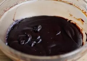 If there are still pieces of undissolved chocolate left in the mixture, heat the bowl in the microwave for 10 seconds and mix again. Repe...