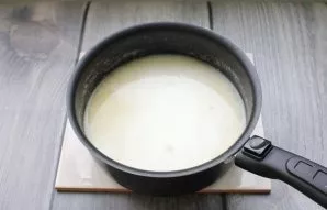 Cook over low heat until the millet is very well cooked. Then add milk.