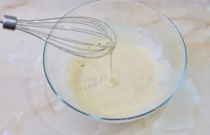 Add salt and spices to taste. Mix everything until smooth so that there are no clumps of flour left. Adjust the consistency of the dough ...