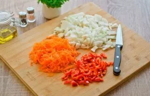 While the potatoes are boiling, prepare the vegetables  peel the onions, carrots and bell peppers. Cut the onion into cubes, grate the ca...