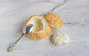 Cut out the top of the buns to make a lid, use a teaspoon to scoop out the bun flesh leaving the sides and bottom.