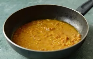 Add water, bring to a boil. In the process, stir constantly.