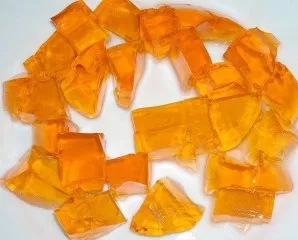 Immerse the bowl with jelly in hot water for 15 seconds, transfer to a plate and cut into large pieces.