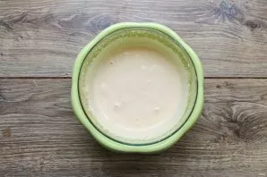 Cool the mixture to room temperature and beat with a mixer until a light and fluffy mass.