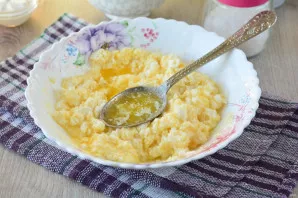 Melt the butter and add to the cottage cheese.