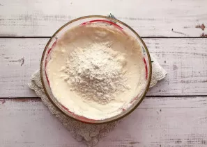 Mix everything with a mixer and add sifted flour. Mix everything well again.