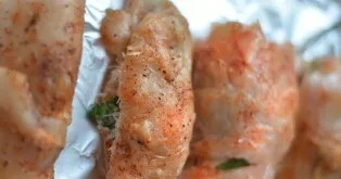 Carefully roll the breasts into rollers, strengthen the edges with toothpicks. Put on a baking sheet lined with foil and place in the oven.