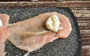 Place cottage cheese on one end.