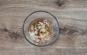 Add chili peppers to the bowl.