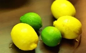 While the filling is beating, squeeze the lemon juice and grate the lime peel.