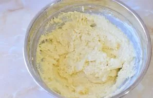 Add soda, a pinch of salt and vanillin to the dough. Then gradually add flour and add it to the dough. The finished dough will be quite t...