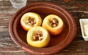 Put walnuts on the raisins.