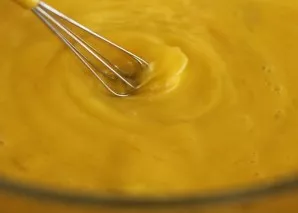 Break the eggs into a deep bowl. Add a pinch of salt and start whipping. Pour in olive oil and, if desired, add a little vanilla extract....