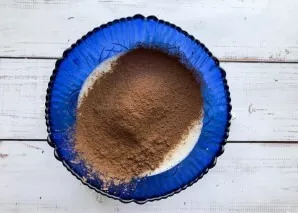 Add cocoa and mix gently.