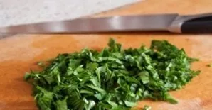 Wash the greens (including mint), dry and chop finely.