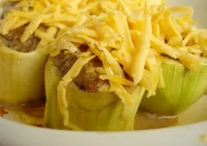 When the zucchini is almost ready, sprinkle them with grated cheese and fry until golden brown, about 20-25 minutes.