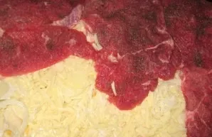 Now we lay out the pieces of beef.