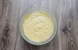 Mix flour with baking powder, sift and mix until smooth. It should be like thick sour cream.