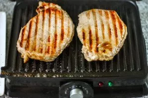If the grill is single, then after the specified time turn the meat to the other side. If double, then it will be completely ready!