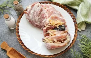 Divide the filling between the pork chops.