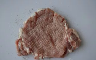 Season with salt and pepper.