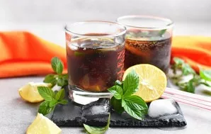 Garnish the cocktails with fresh mint leaves and serve.