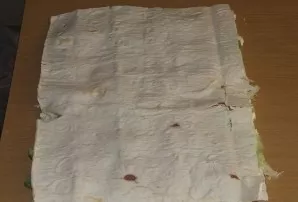 Cover with a second sheet of lavash.