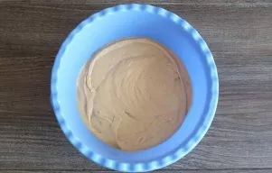 Beat the contents of the bowl with a mixer for 2-3 minutes. The mass should become lush and fluffy, slightly elastic.