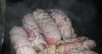 Carefully roll each piece of meat into a roll so that the filling is in the middle. Then strengthen the edges with toothpicks or twist th...