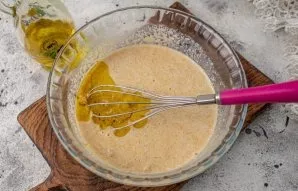 Pour in olive oil, stir.