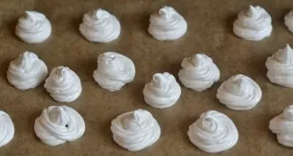 Line the baking sheet with baking paper. Put the protein mass from the culinary syringe on it. Preheat the oven to 100 degrees and dry th...