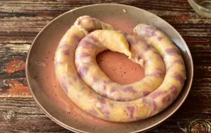 Fill the hose with the obtained mass. Be sure to tie the edges with thread.