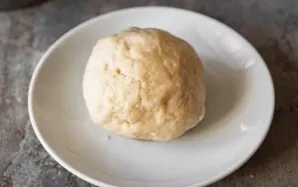 Knead a soft dough that does not stick to your hands. Cover the plate with dough with a kitchen towel and leave for 30 minutes.