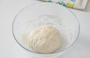 Knead soft and slightly sticky dough with your hands. Knead into a ball and cover with a towel.