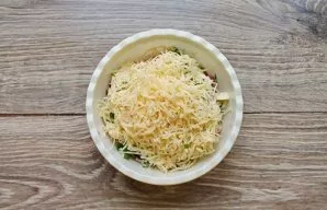 Grate the cheese on a medium or fine grater and add to a bowl with sausage, butter and onion. Mix everything well, if necessary, salt the...