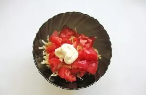 Season the salad with mayonnaise.