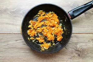 Simmer the vegetables for 7 minutes over medium heat, stirring occasionally.