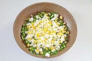 Cook, stirring over low heat, for about 5 minutes. Add the boiled eggs chopped into cubes.