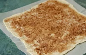 Sprinkle with the mixture on top of the dough.