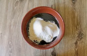 Sift the flour and add the flour to most of the chocolate mixture and mix until smooth.