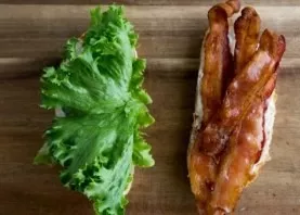 Put bacon and lettuce on bread.