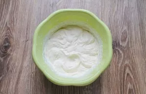 Beat the cream well and add it to the whipped cream cheese. Stir gently until smooth.